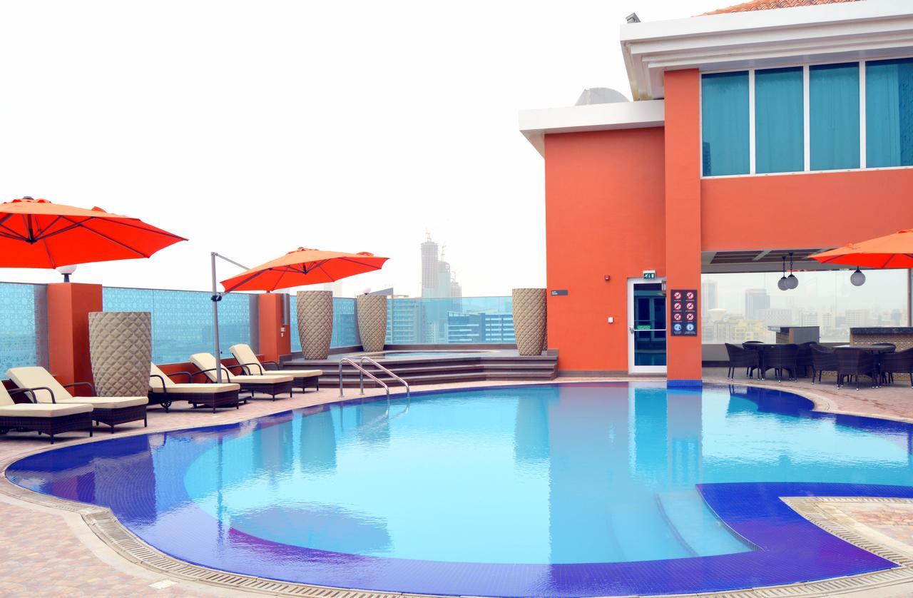 Ramada By Wyndham Manama City Centre Экстерьер фото
